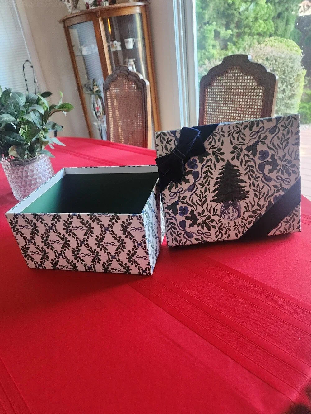 Martha Stewart Christmas gift box with navy and green floral and ribbon design